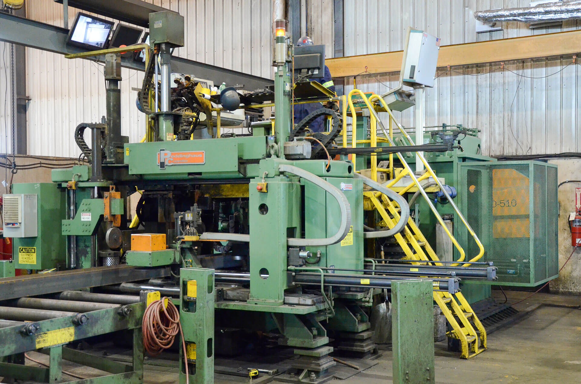 Band Saw Integration for Extended Cutting Capabilities Band Saw Integration for Extended Cutting Capabilities